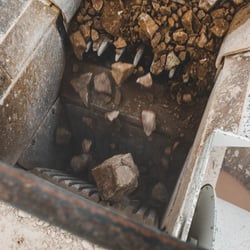 Large rocks feeding into jaw crusher top view