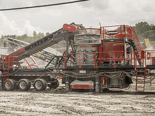 Superior's Patriot Cone Crusher in position during startup at a rock quarry.