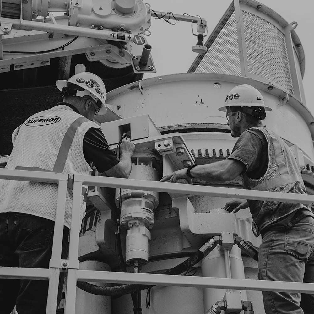 Service guys working on a patriot cone crusher