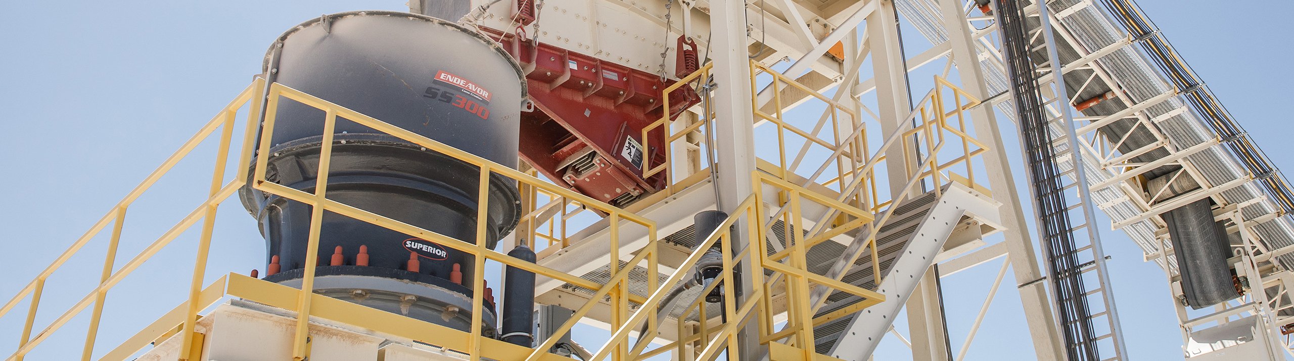 Endeavor® S300 spider bushing cone crusher installed in a stationary aggregate processing plant
