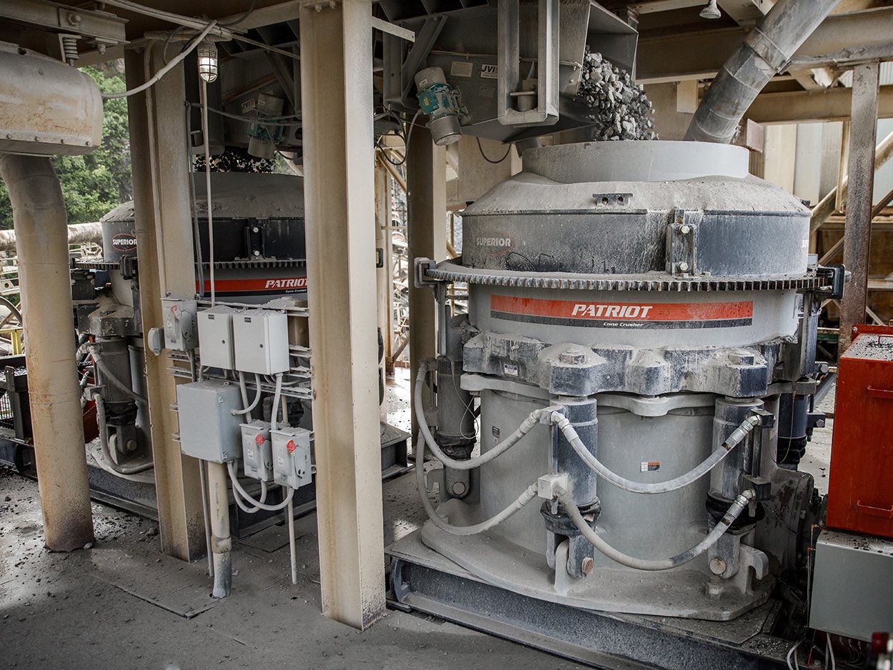 Twin Patriot® Cone Crushers processing aggregate in a stationary crushing plant