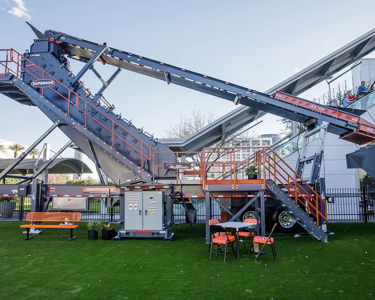 Superior Industries Independence™ High Frequency Screen portable plant displayed at CONEXPO, featuring a steep multi-slope screen, feed conveyor, and service platforms for fine material screening.