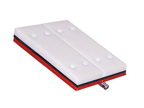 10-inch single sealing cartridge pad for conveyor load zones, designed to mount to idler frames to support the belt and prevent sag between rolls
