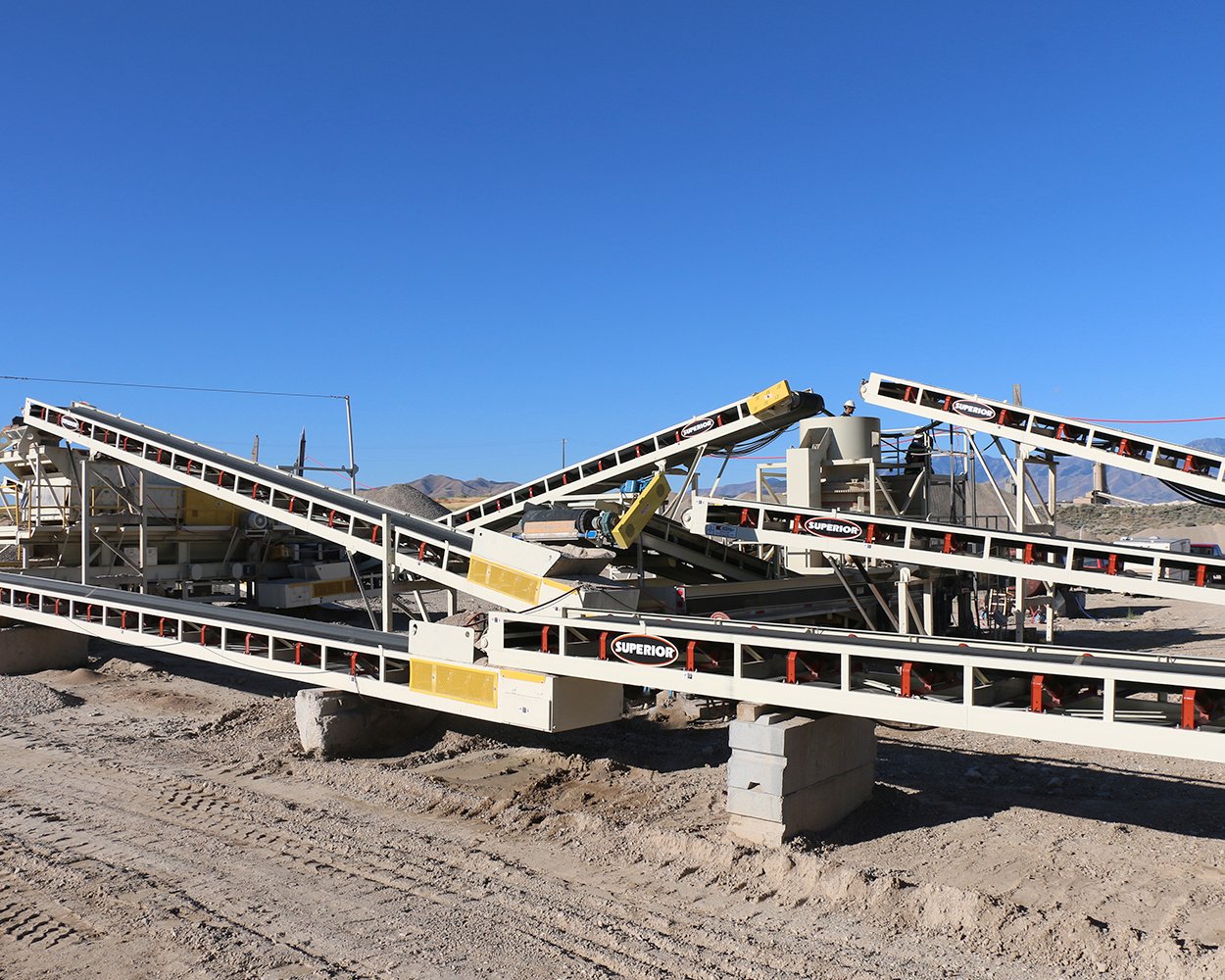 Zipline® Overland Conveyor transporting sand and gravel long distance across open pit site