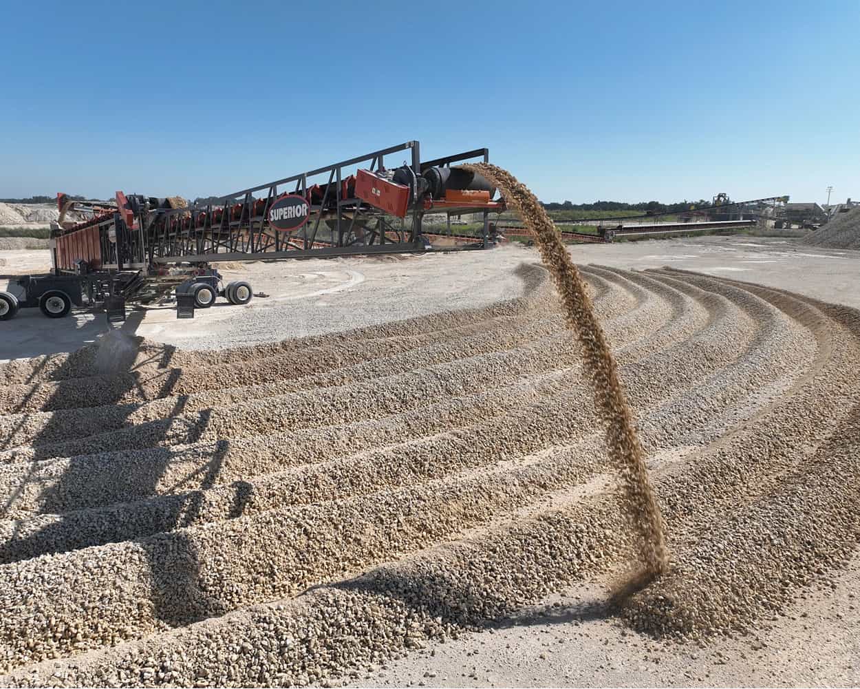TeleStacker Conveyor stockpiling crushed stone at Central Texas Stone & Aggregate in Florence, Texas