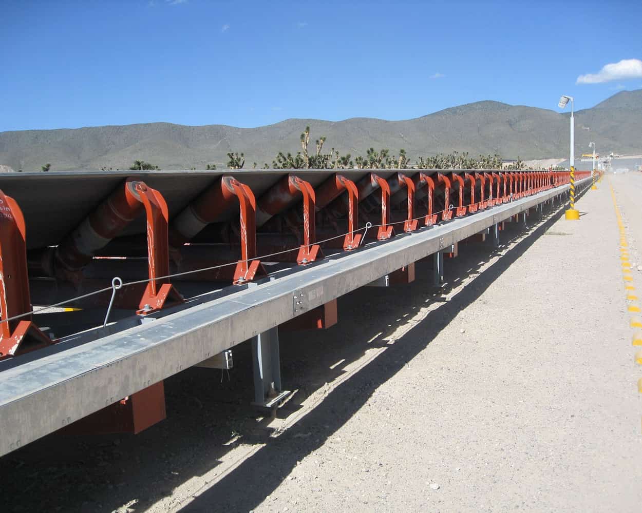 mining site BArrick Gold idlers on overland conveyor