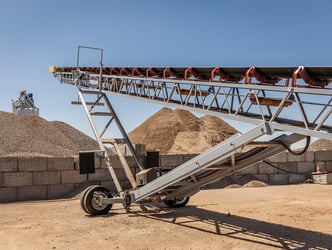 conveyor ready for maintenance with stockpile in background 