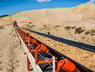 conveyor belt full of material being conveyed overland