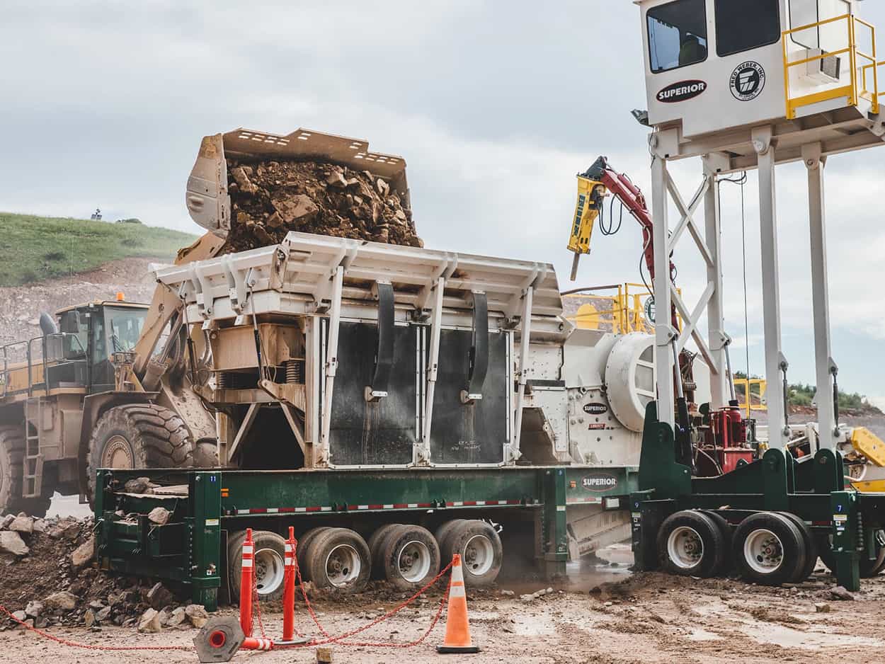 30x55 Liberty Jaw Crusher loaded by wheel loader at Fred Weber site in Loveland, Colorado