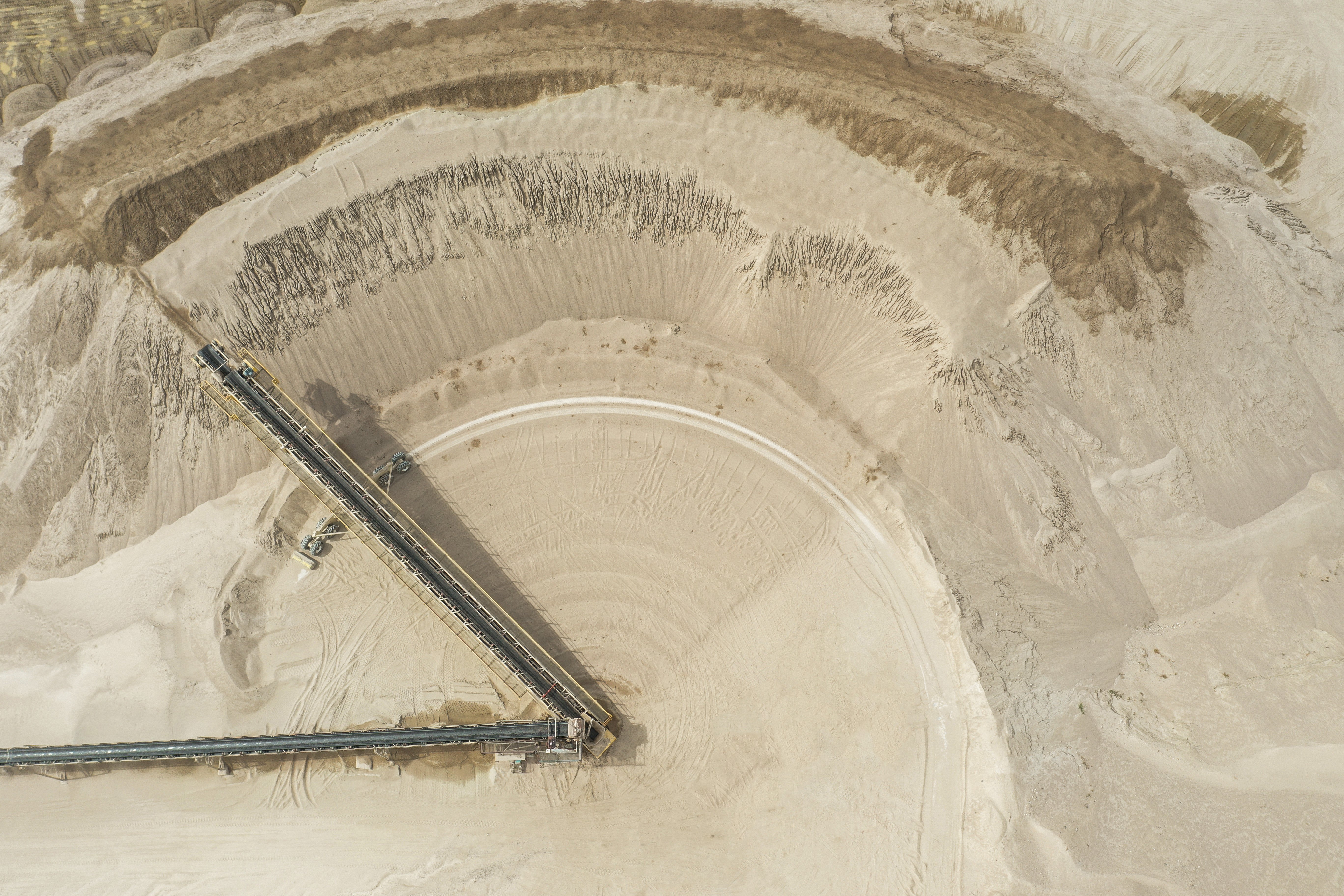 radial stockpile of sand at Ossipee Aggregates NH_8-27-2025_005