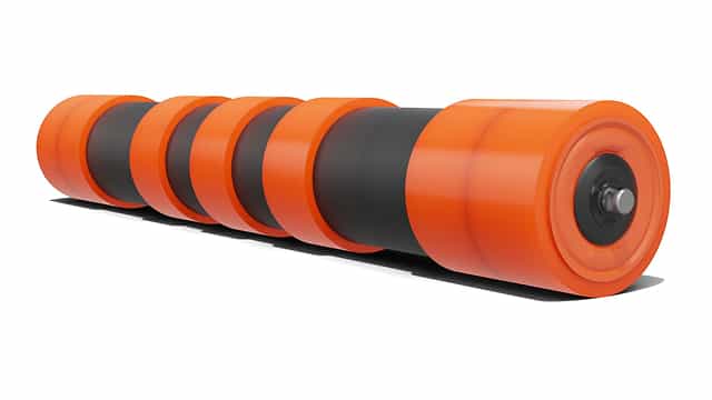 3D rendering of Urathon return idler with urethane discs and sleeves in multiple configurations, designed for extended wear life in abrasive applications.