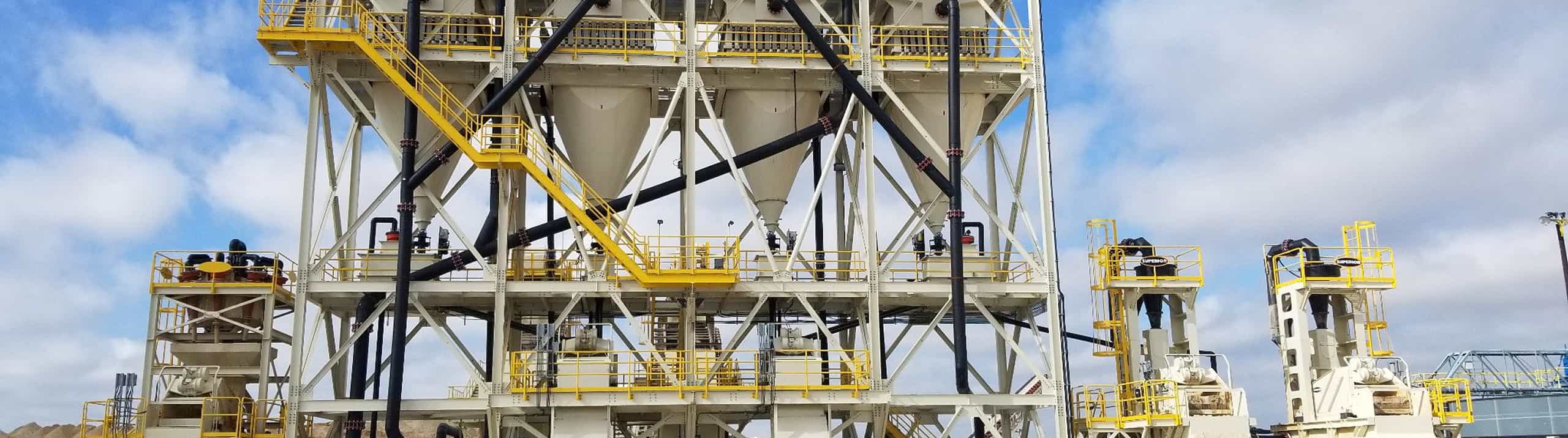 Density Sizers installed in a row onto large stationary platform for frac sand operation in Texas