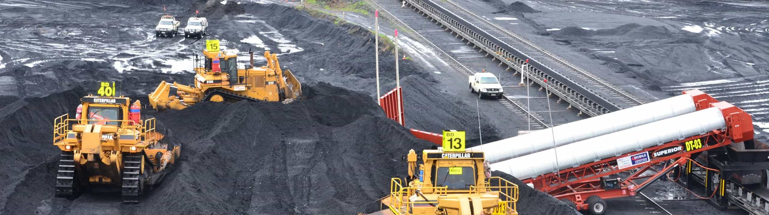 Dozer trap feeding an overland conveyor on site