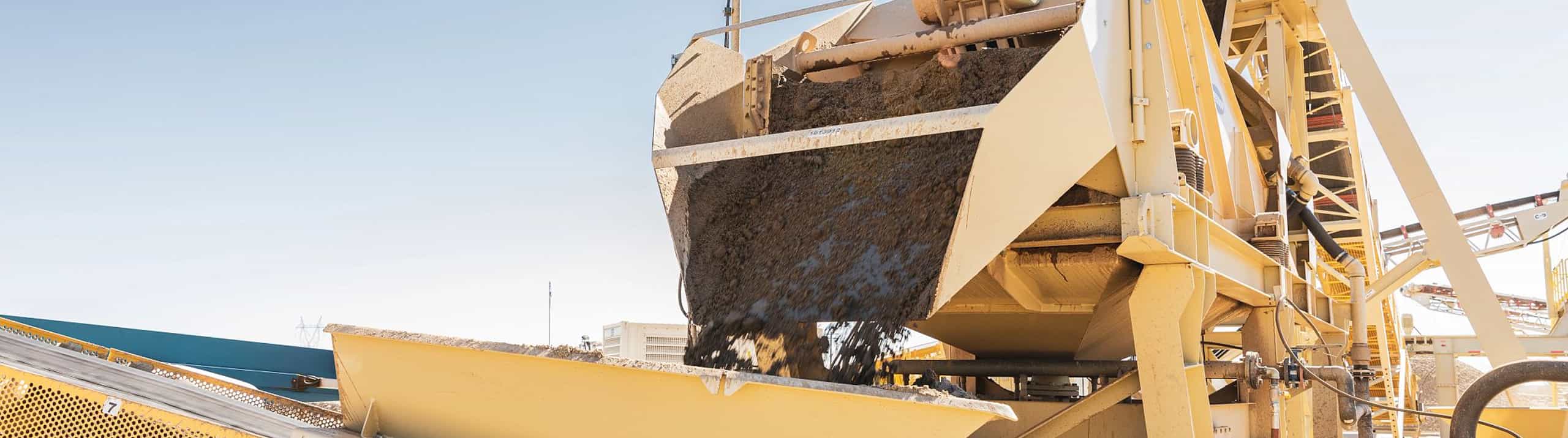 Finished and dewatered sand coming off of head of low water sand washer Alliance® Low Water Washer