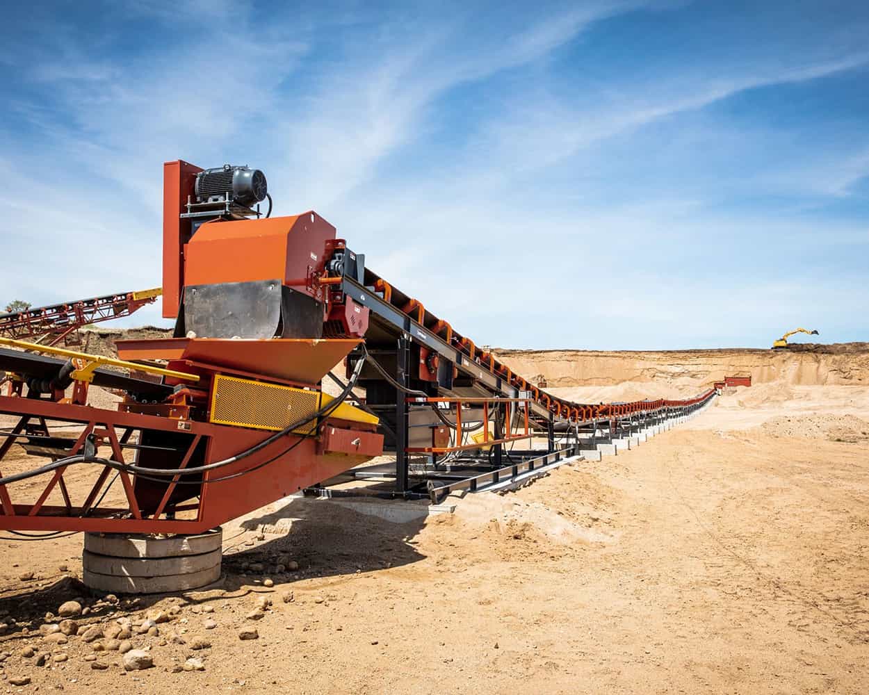 Zipline® Overland Conveyor transporting sand and gravel long distance across open pit site