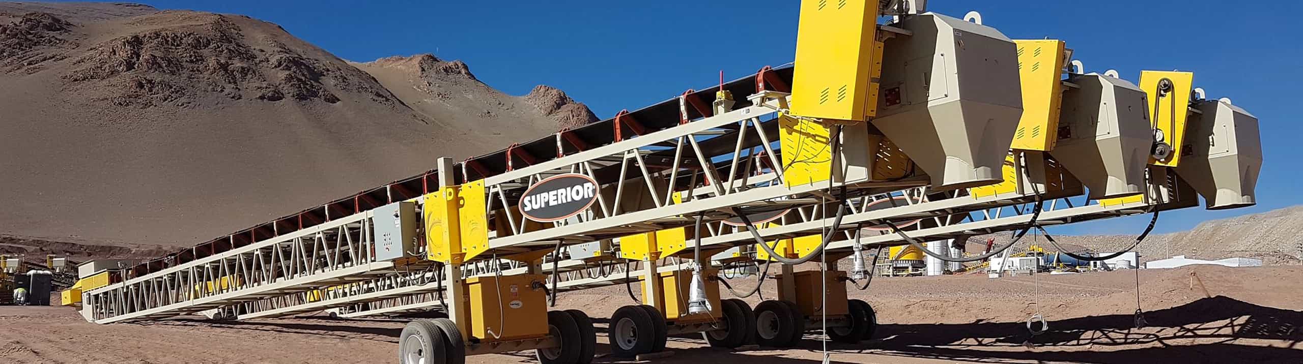 Three transfer conveyors aligned in a row ready for heap leach conveying installation