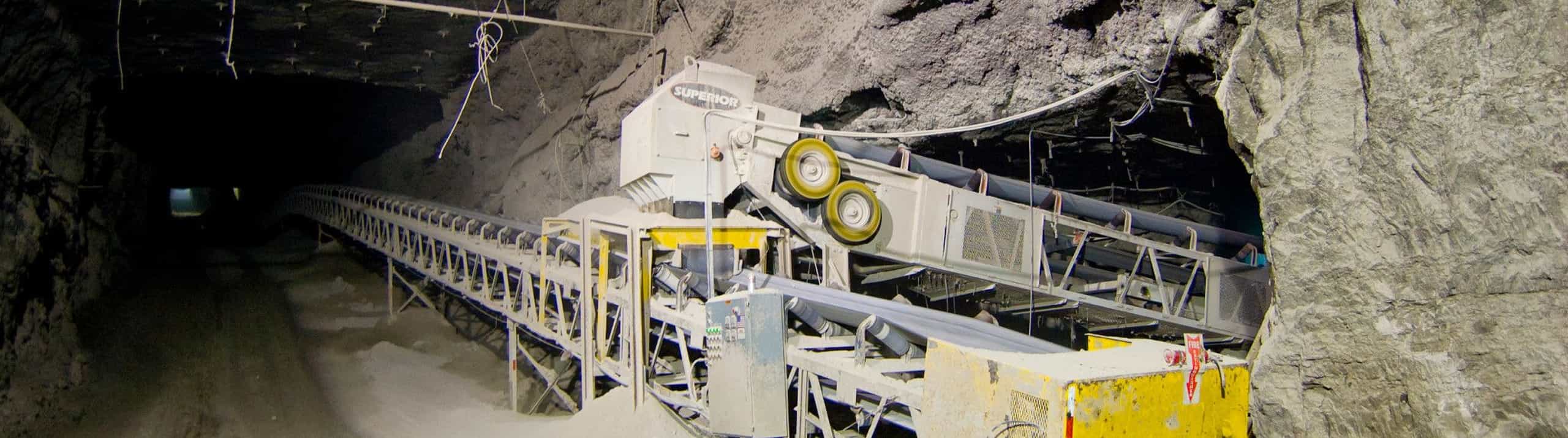 Underground conveyor in operation at mineral mine tunnel opening in Missouri