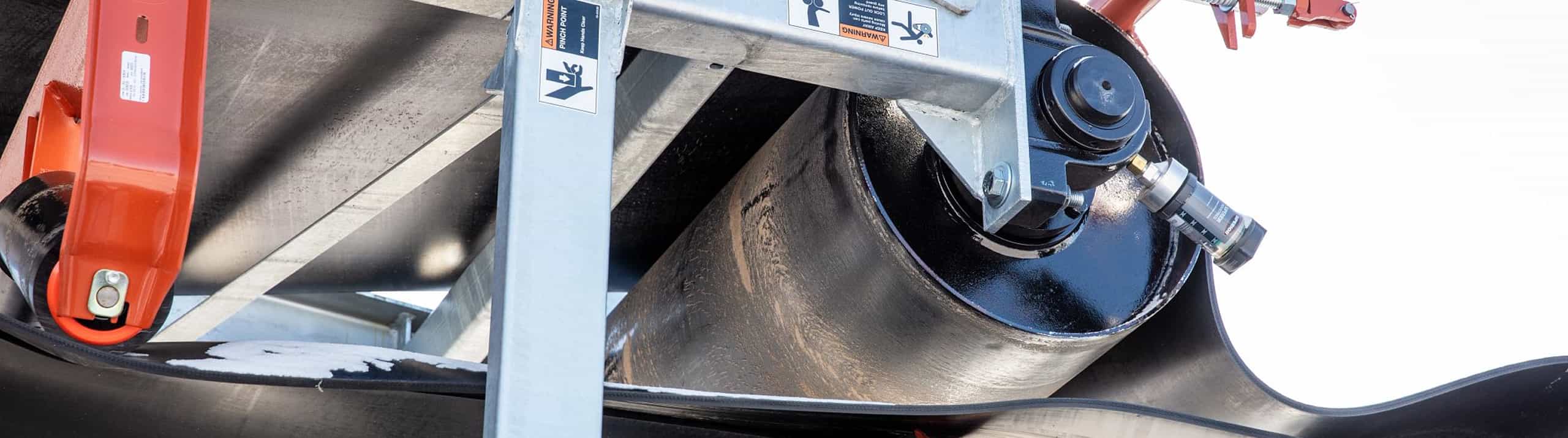 Closeup of drum pulley on new aggregates conveyor ready for transport
