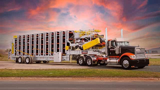 Superior® Trailblazer® Conveyor system mounted on a semi-truck for portable material transfer.