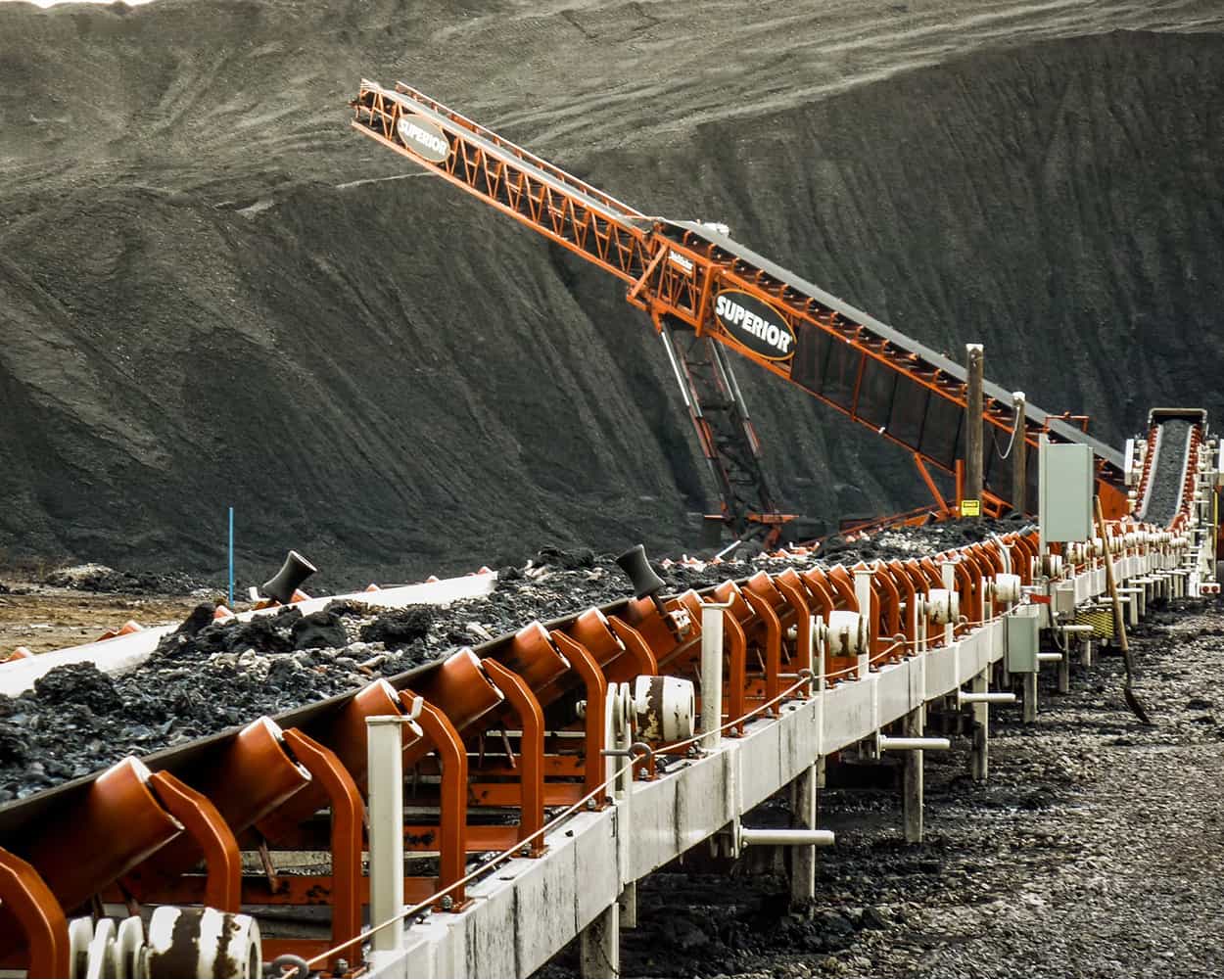 Superior Zipline Conveyor system transporting fuel material to a TeleStacker Conveyor in an energy generation application