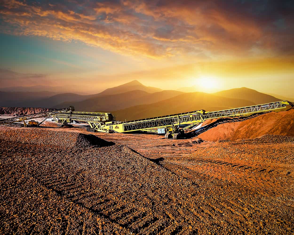 Heap leach conveyor setup at dawn