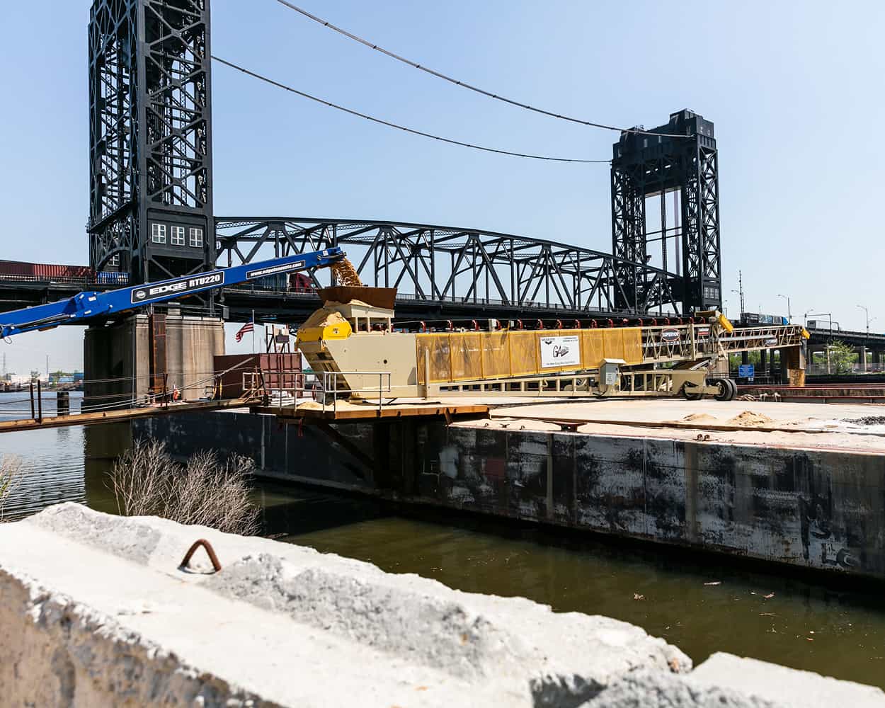 Gotham Aggregates in Newark NJ TeleStacker Conveyor remote control barge loading