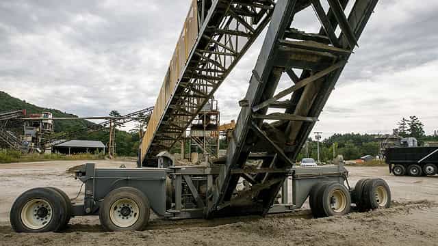 Superior® TeleStacker® Conveyor in operation at an aggregate site, designed for automated stockpiling and preventing material segregation.