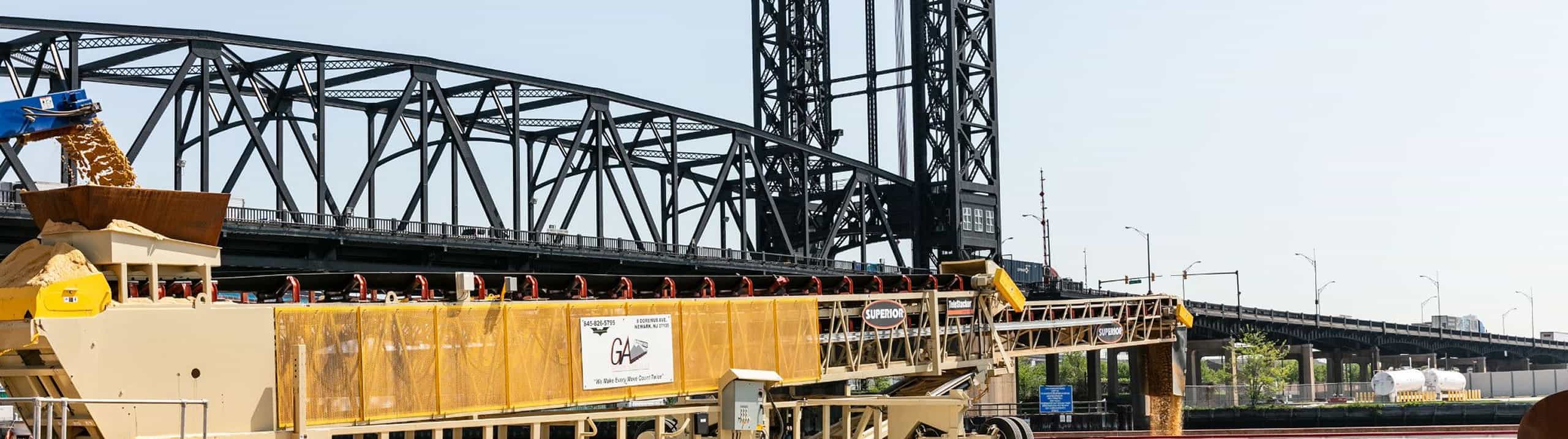 TeleStacker® Conveyor barge loading sand and gravel at New Jersey riverside site