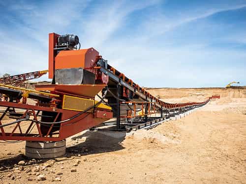 Zipline® Overland Conveyor transporting sand and gravel long distance across open pit site