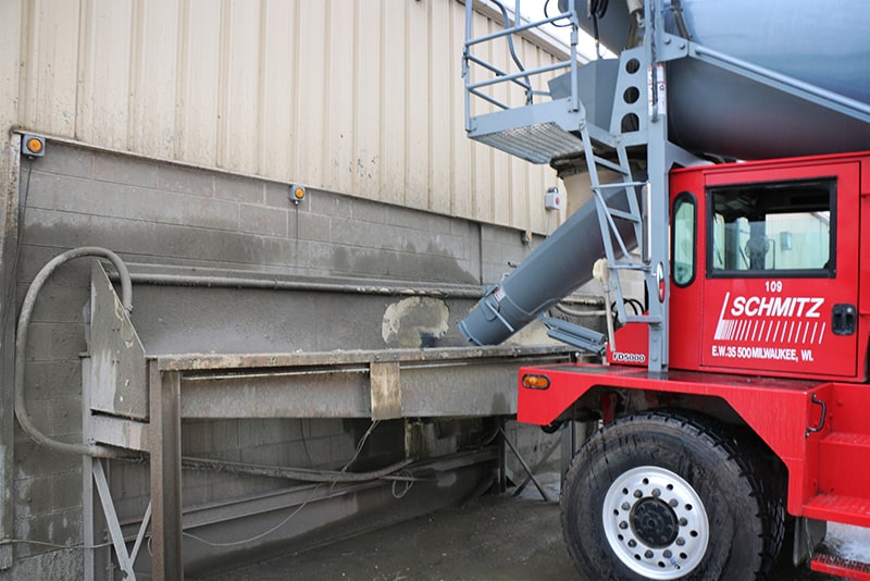 Concrete truck utilizing washout system